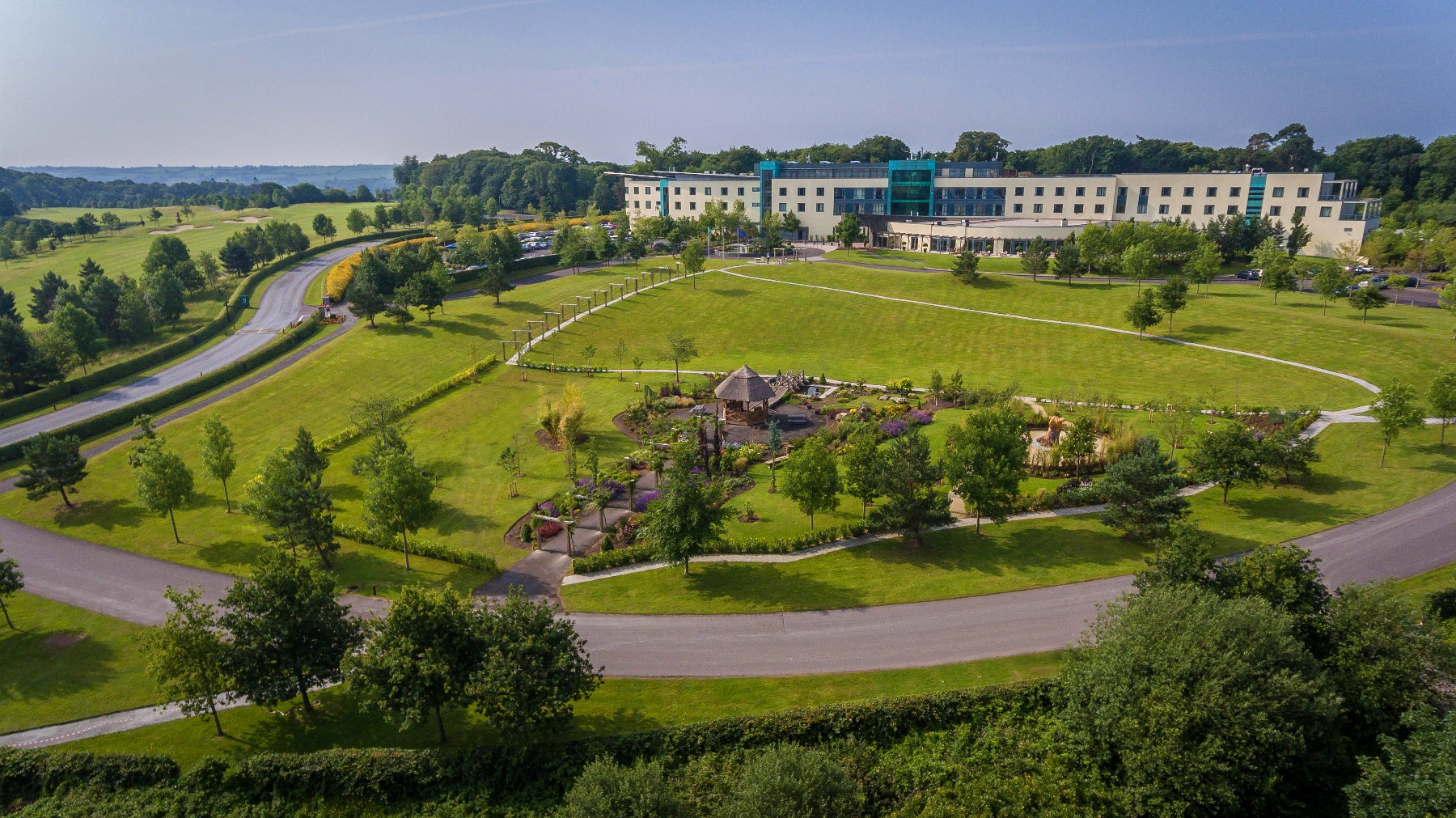 Drone image of front of hotel and Oriental garden