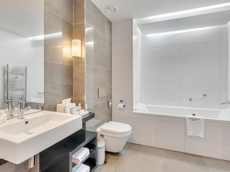 Family room bathroom image of bath and toilet