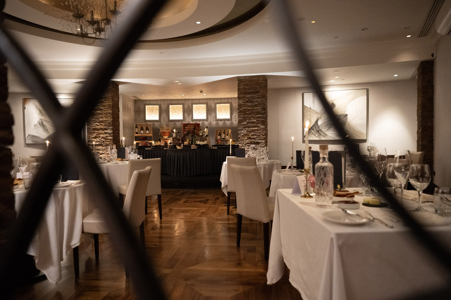 Image of The Cove setup shot through the bars of the interior