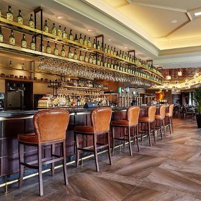 Shot of bar counter and stools at The Amber Bar and Lounge