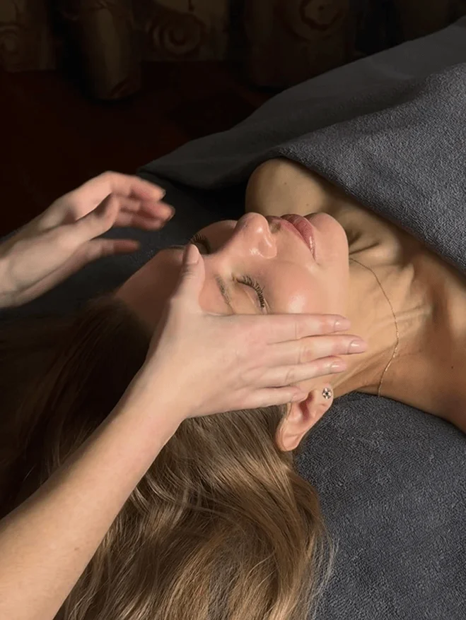 Lady receiving facial treatment