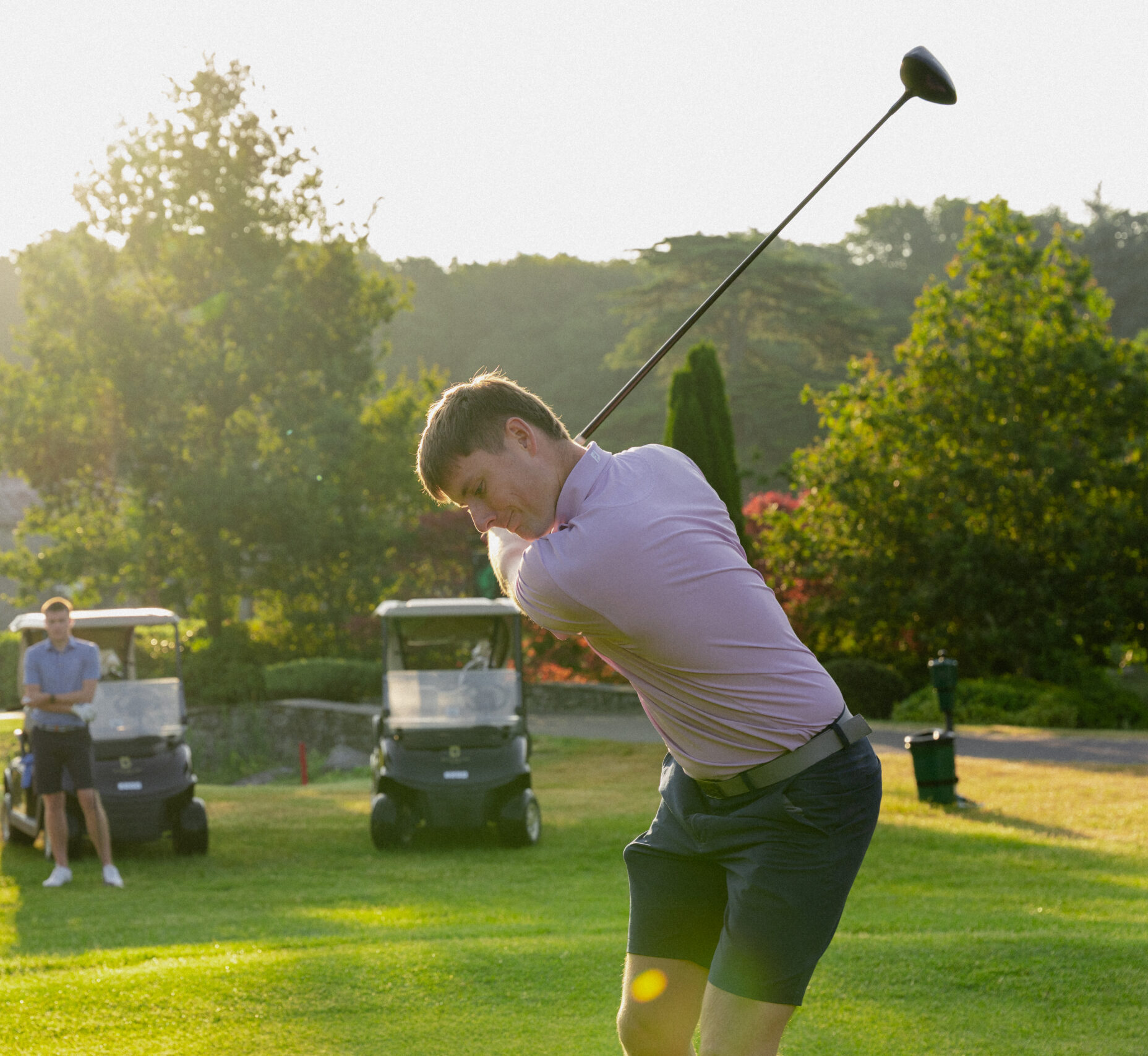 Golfer teeing off at our 1st hole at Fota Island Resort