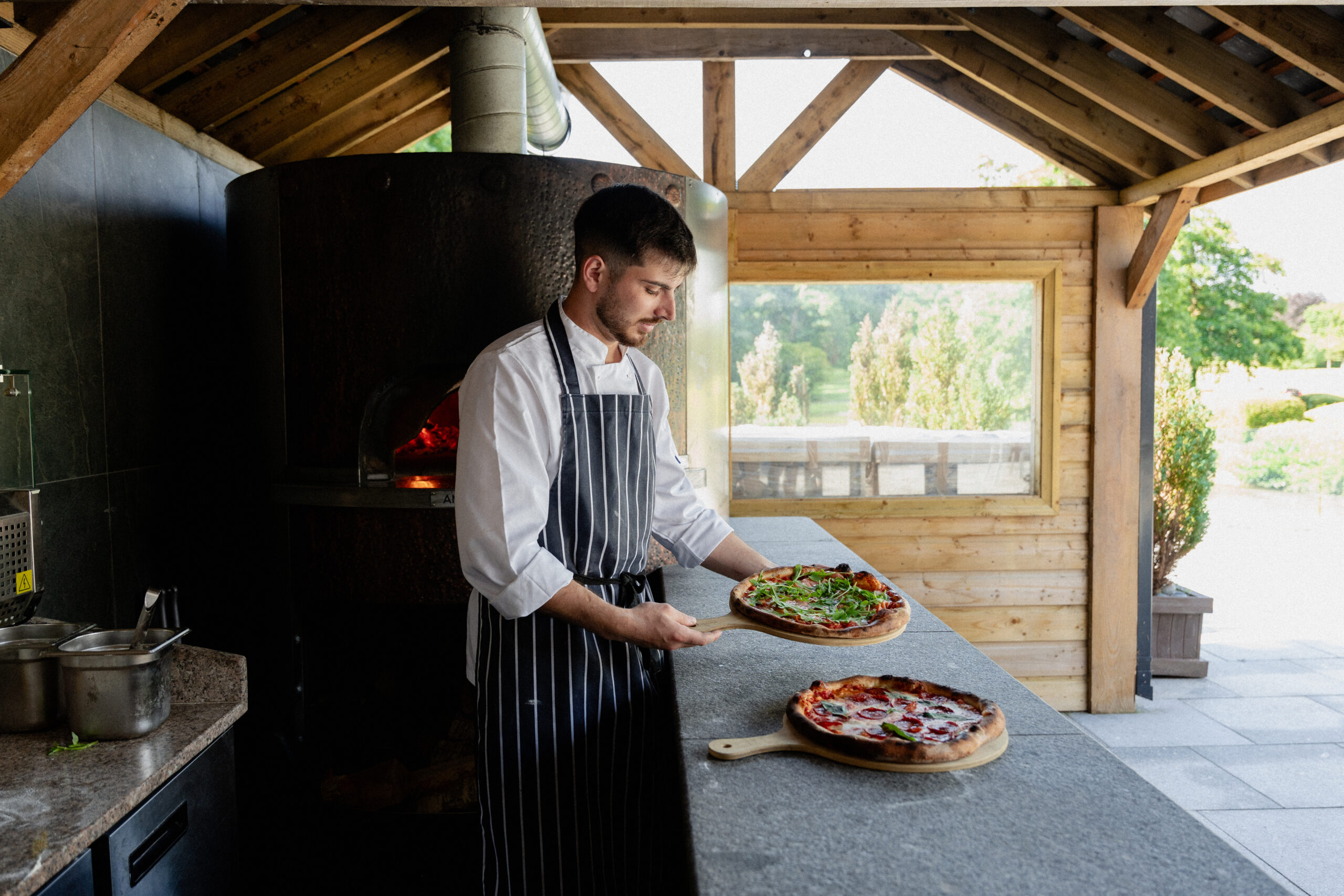 Chef preparing Pizzas at The Clubhouse