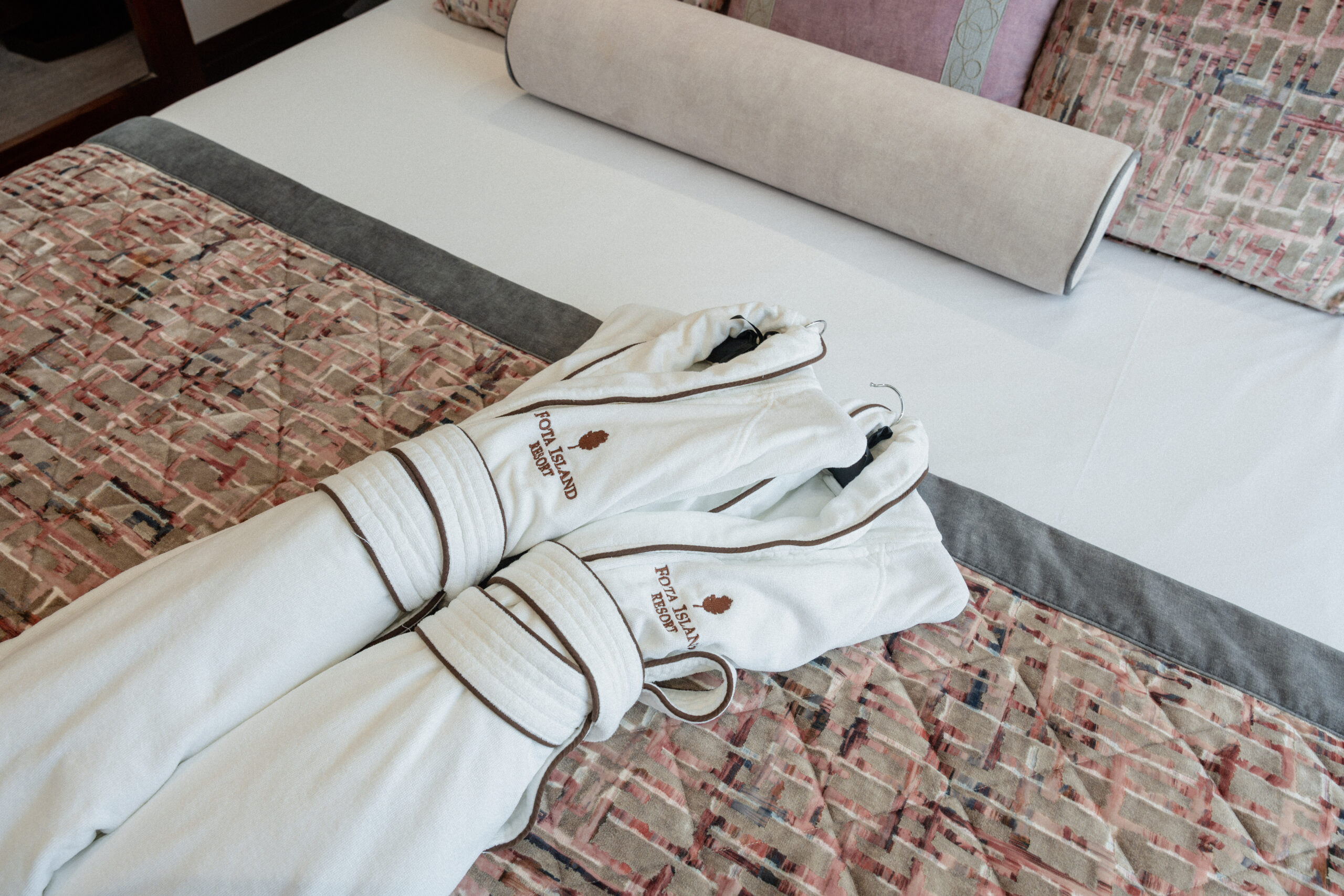 Fota Island robes placed on the bed