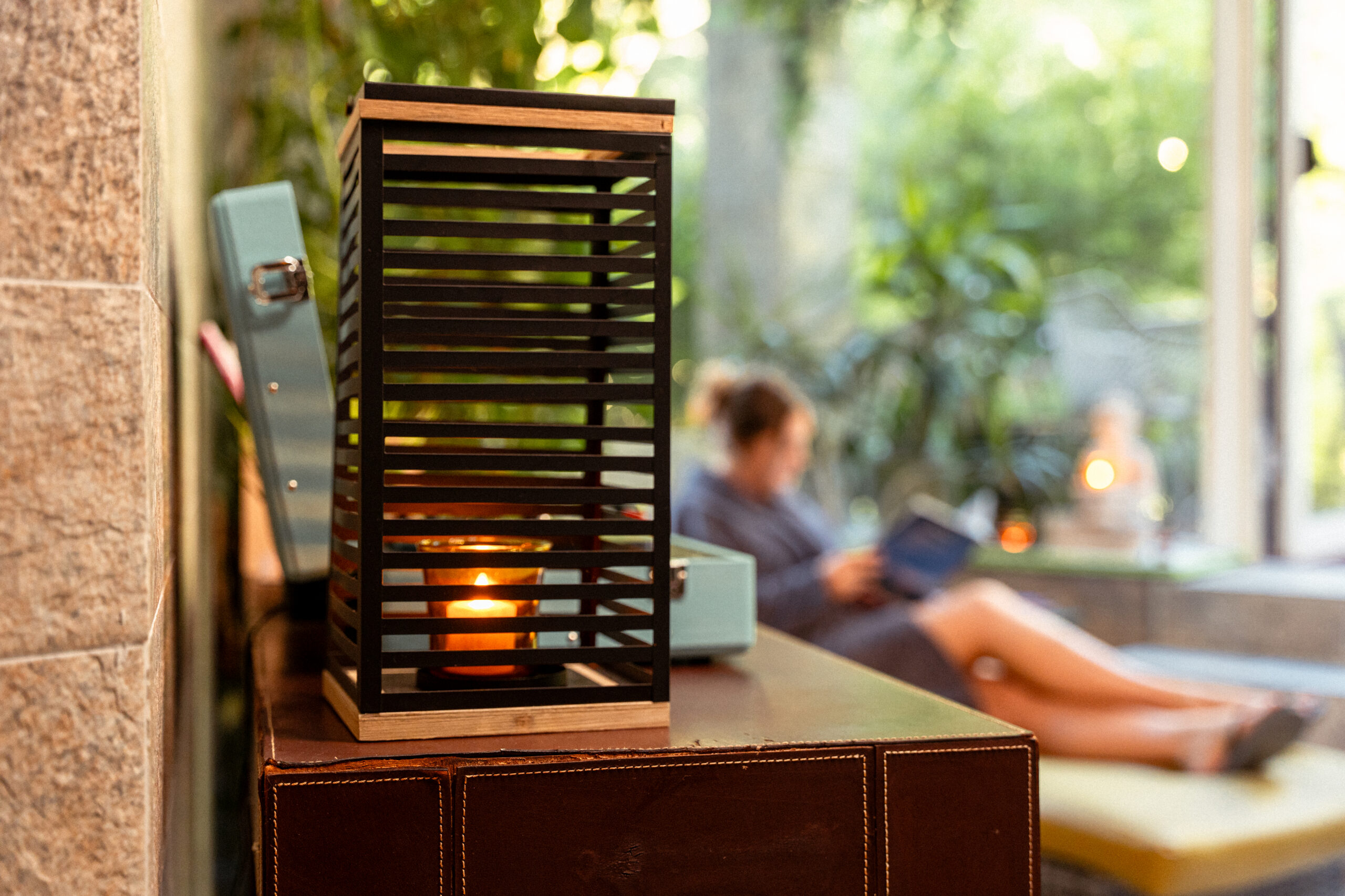 Candle in spa relaxation area