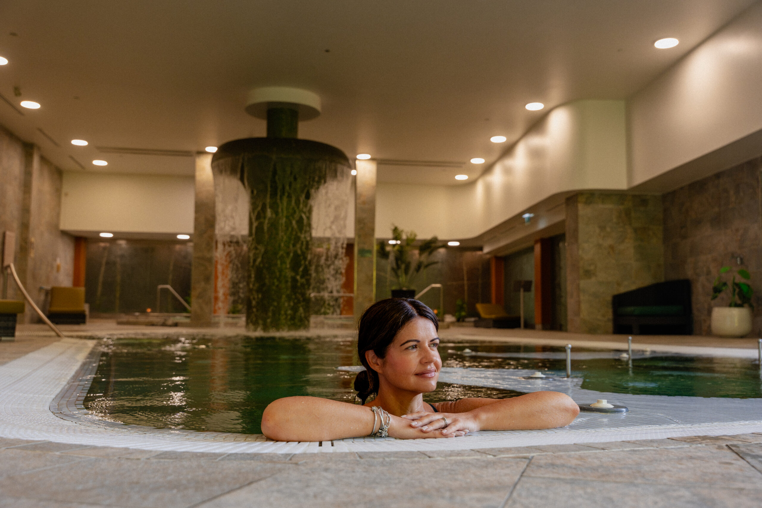 Lady relaxing in the hydrotherapy pool