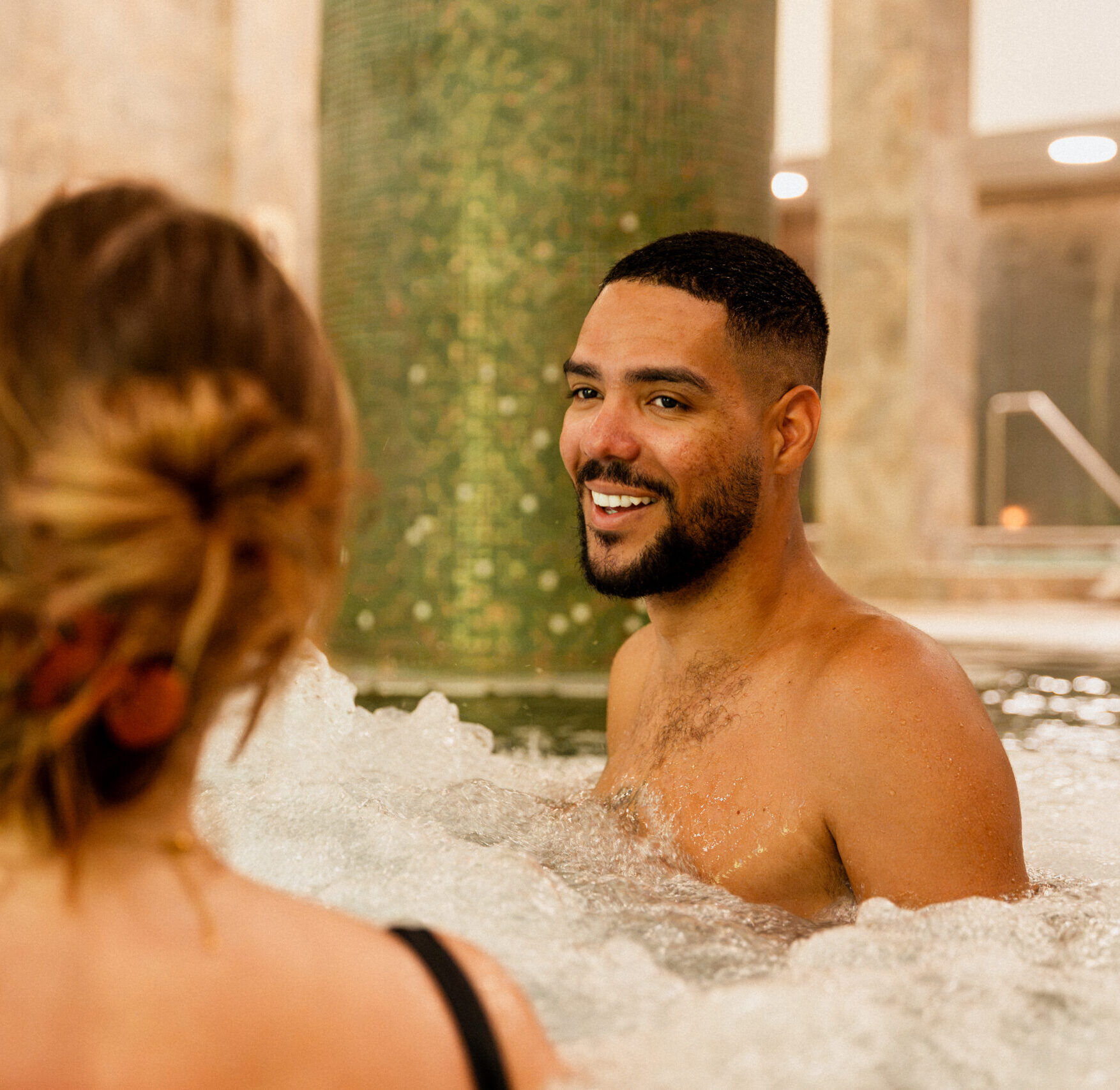 up close shot of man in hydrotherapy pool