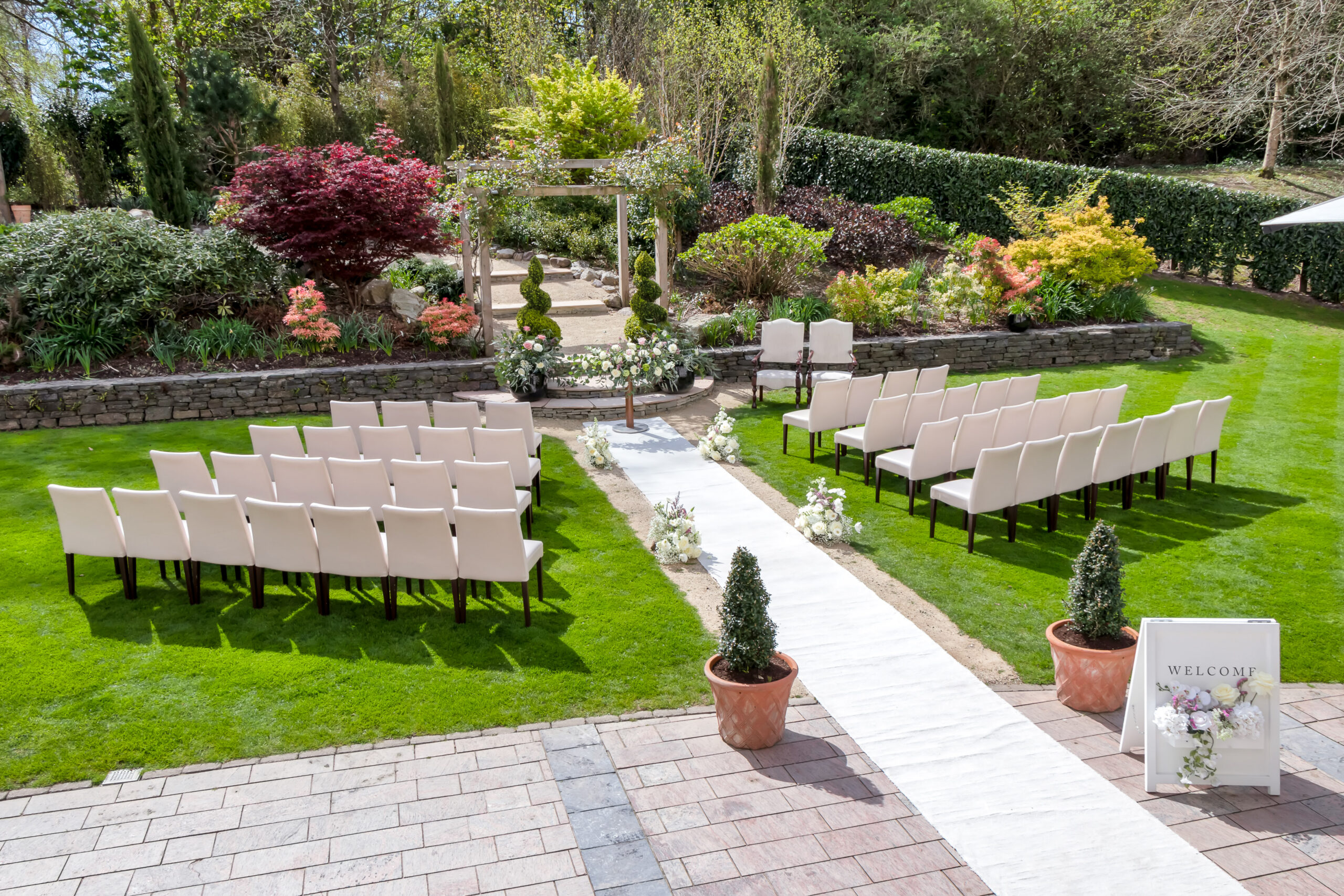 Drone image of wedding ceremony set up in the smithbarry garden