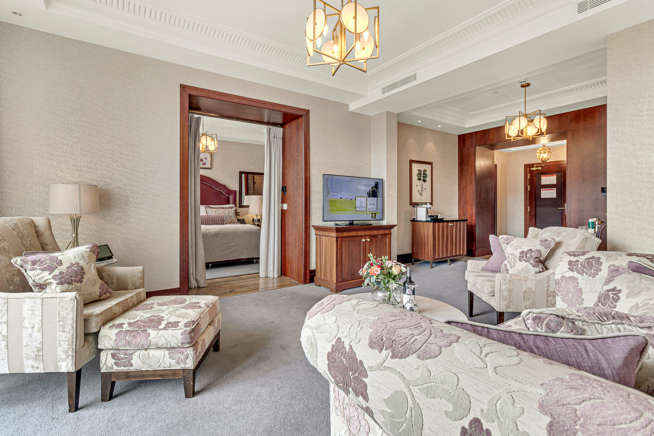 Deluxe suite living area and bedroom image